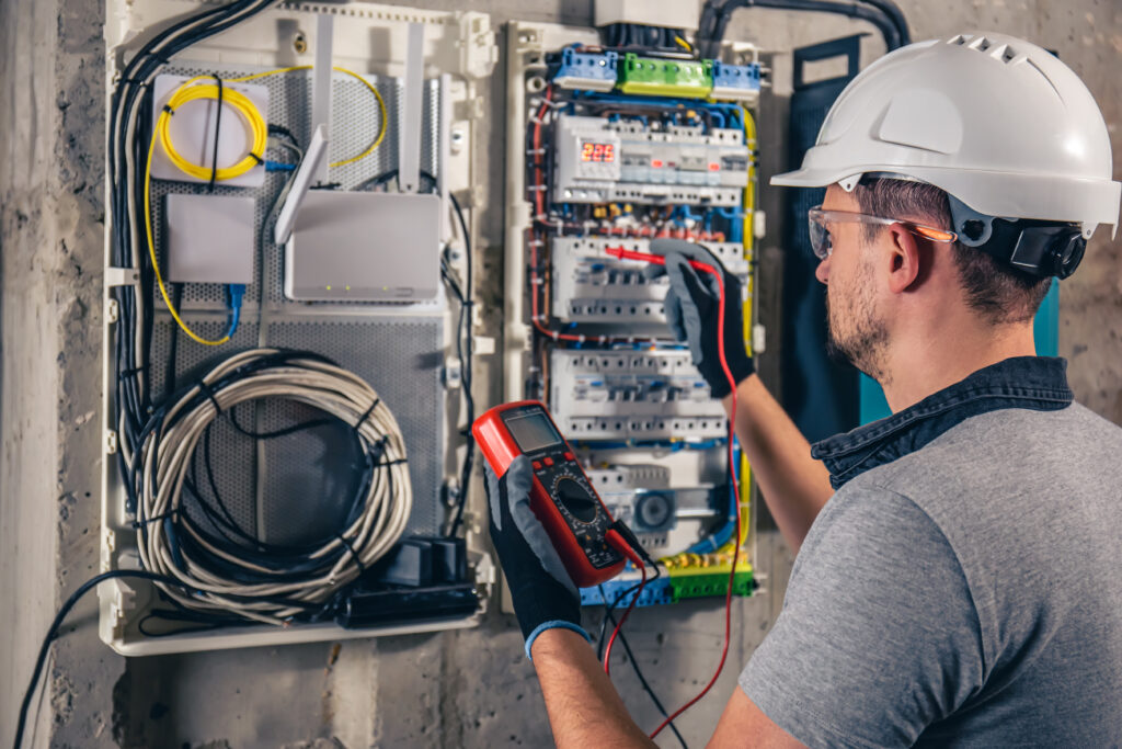 Emergency electrician fixing tripped breaker in Edmonton